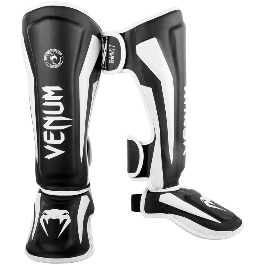 Paratibie Venum Elite Nero/Bianco per Muay Thai, Kickboxing e MMA