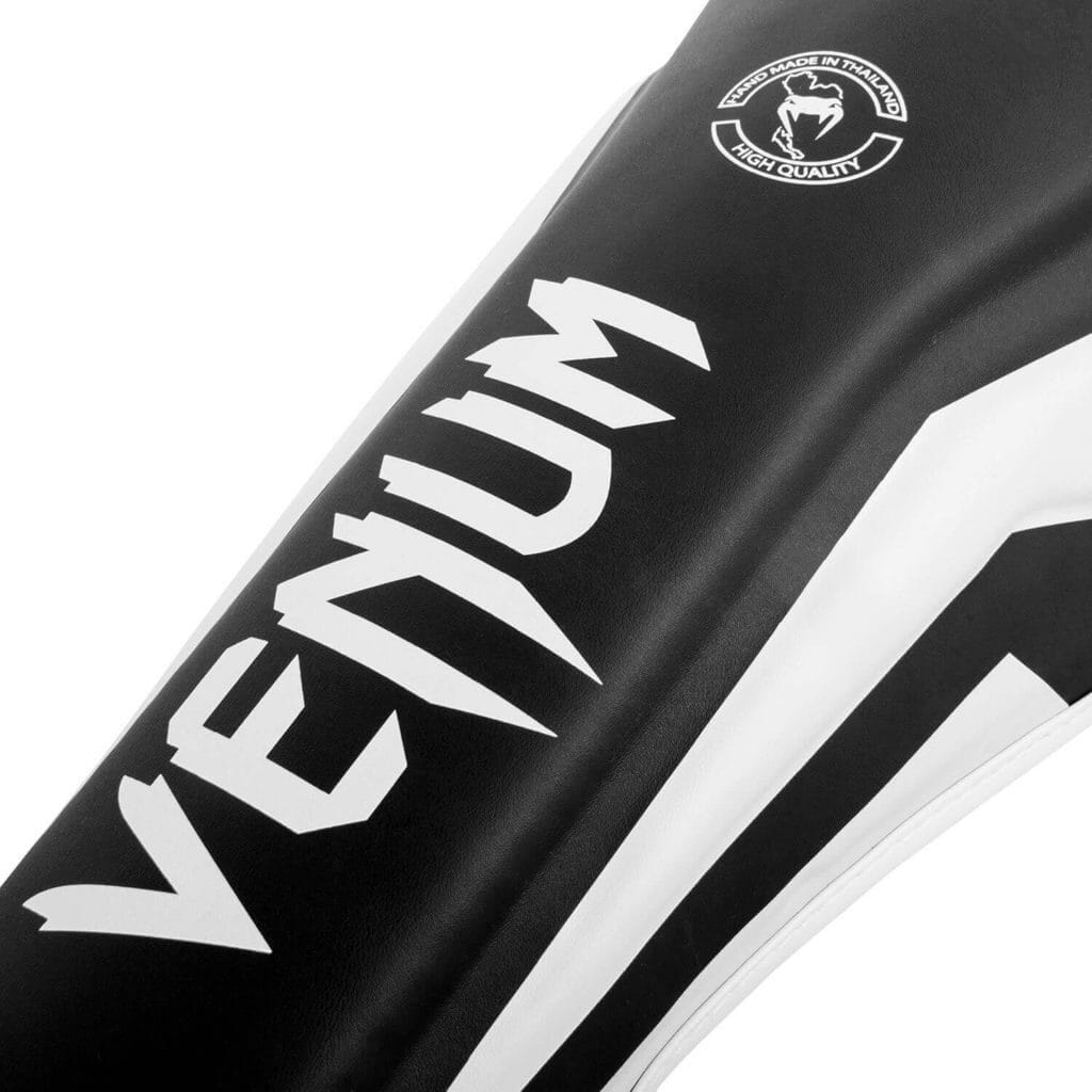 Paratibie Venum Elite Nero/Bianco per Muay Thai, Kickboxing e MMA