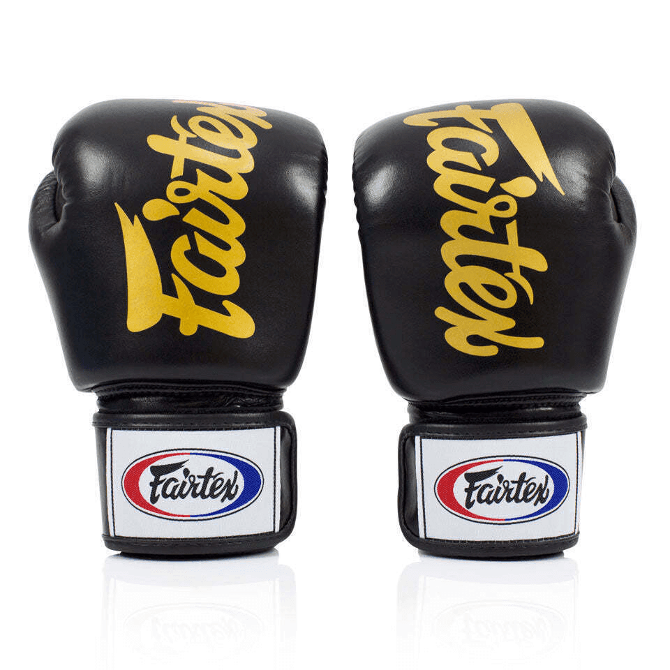 Guantoni Fairtex Nero Oro Muay Thai per allenamentie di Boxe e Kickboxing
