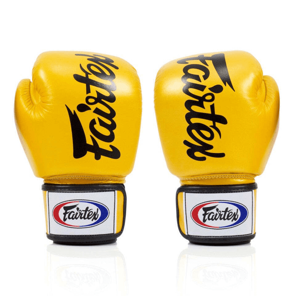 Guantoni Fairtex Oro/Nero Muay Thai per allenamentie di Boxe e Kickboxing
