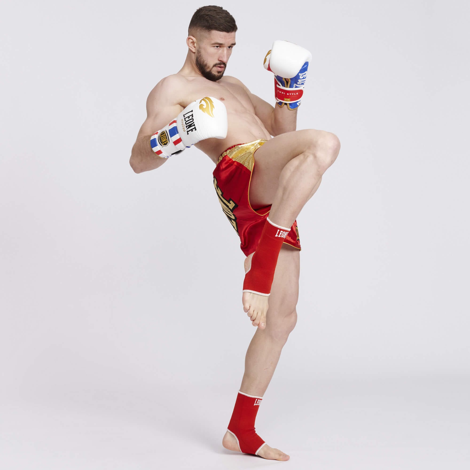 Cavigliere elastiche Leone 1947 reversibili rosso/blu per sostenere la caviglia durante gli allenamenti di Kickboxing, Muay Thai o MMA