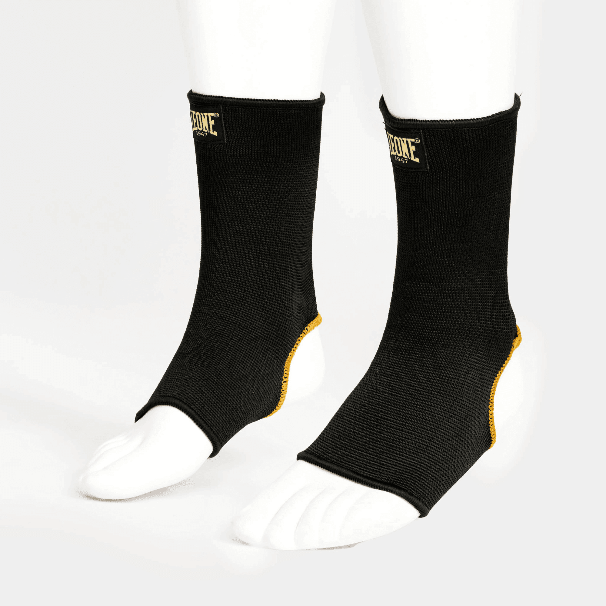 Cavigliere Kickboxing/Muay Thai DNA Leone 1947 Nero/Oro per allenamenti e match. Sostegono l'articolazione e aiutano a stabilizzare la caviglia durante gli allenamenti o i match.