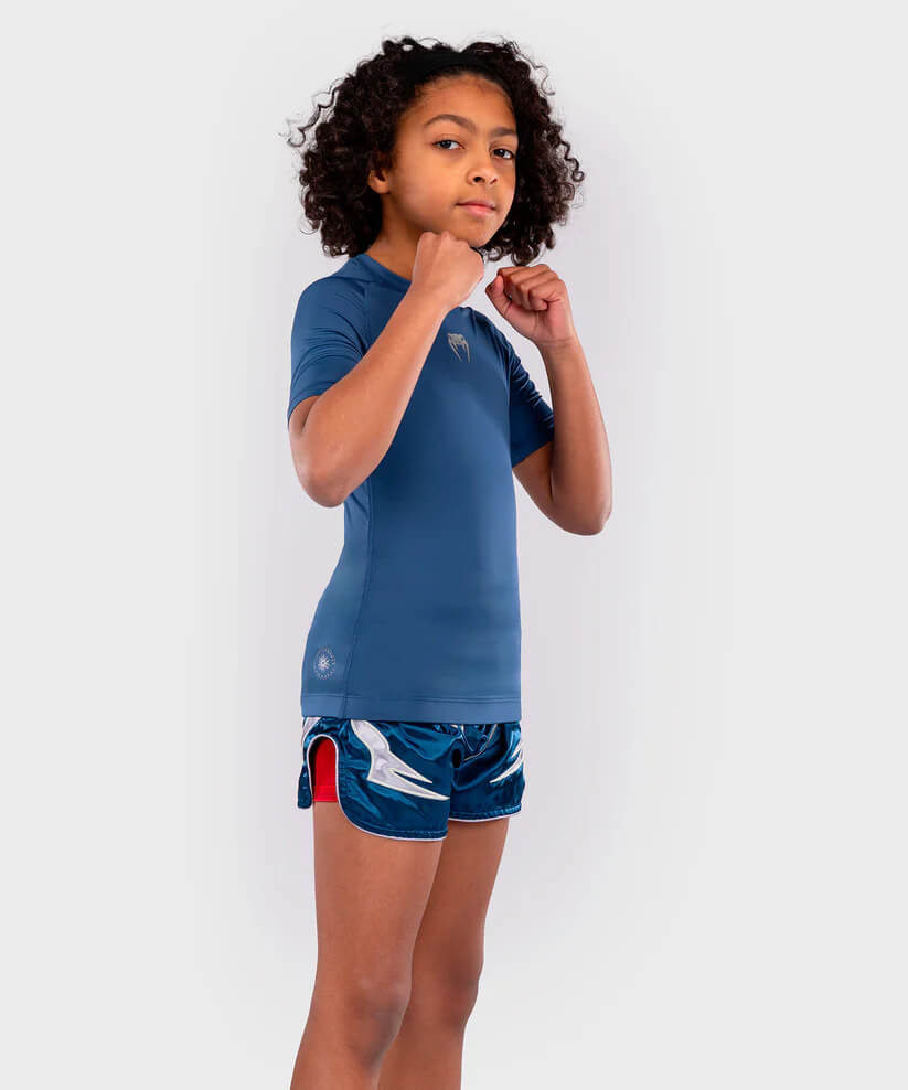 T-shirt tecnica rashguard per bambini Venum Contender Blu per Pugilato, Brazilian Jiu Jitsu. Grappling, Kickboxing e Muay Thai con tessuto comodo ed elastico, maniche corte