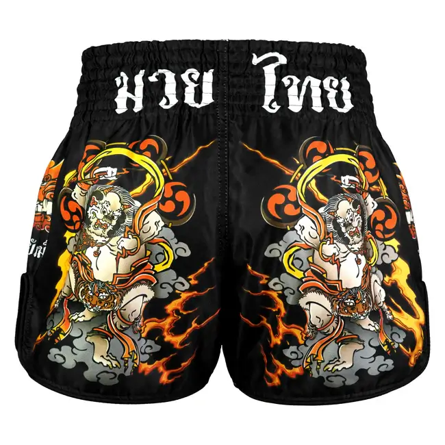 Pantaloncini Muay Thai TuffPayak Raijin The Tunder God Nero/Giallo/Arancione per allenamenti e match di Muay Thai, Kickboxing. Pantaloncini Made in Thailand.