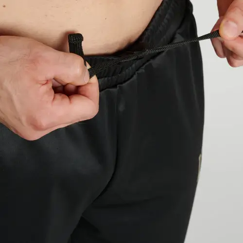 Pantalone Leone 1947 DNA Nero/Oro ABX727_01 - Boxe Kickboxing, MMA e Muay Thai. In poliestere, ottima anche per il tempo libero o la sala pesi.