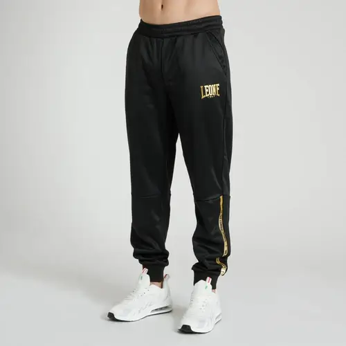 Pantalone Leone 1947 DNA Nero/Oro ABX727_01 - Boxe Kickboxing, MMA e Muay Thai. In poliestere, ottima anche per il tempo libero o la sala pesi.