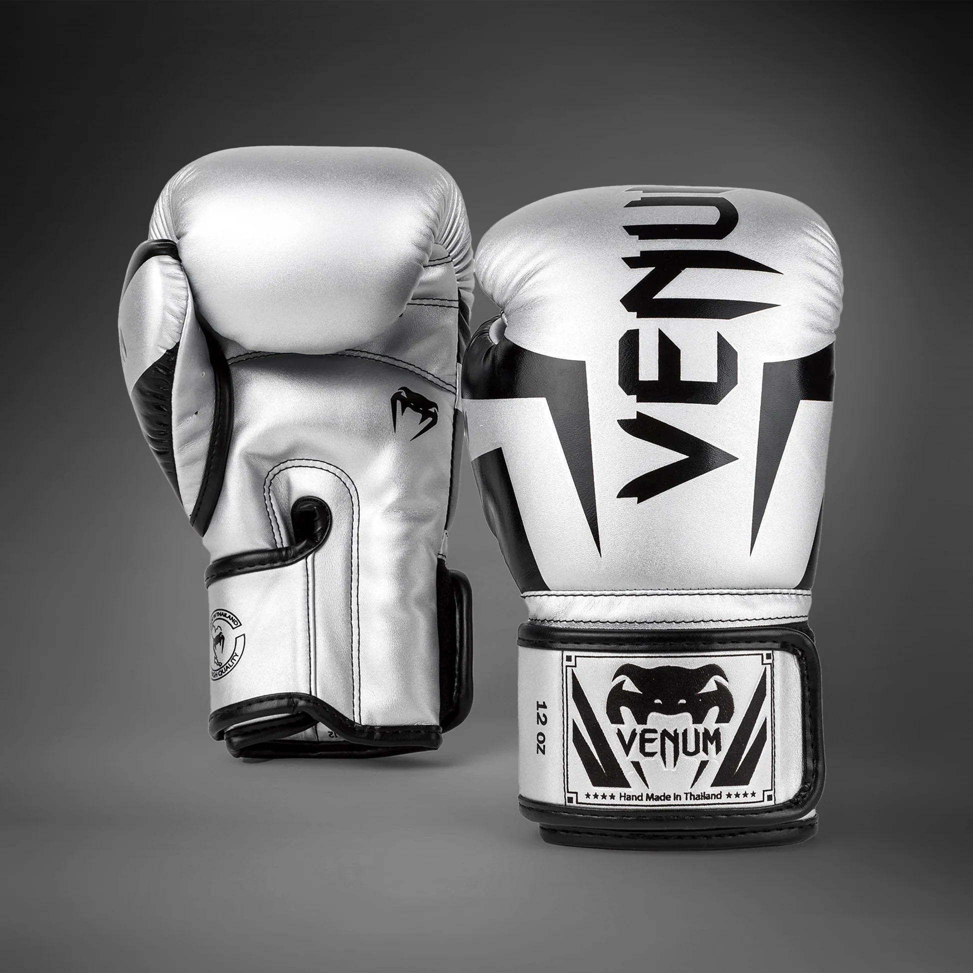 Guantoni Elite Venum Argento Venum-1392-451 per allenamenti e match di Boxe, Muay Thi e Kickboxing. Guantoni Made in Thailand per Agonisti ed esperti.