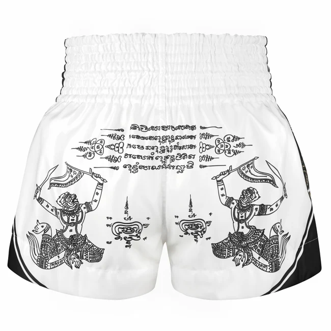 Pantaloncini Muay Thai Tuff Sacred Guardian Bianco MS689 per allenamenti e match di Muay Thai e Kickboxing. Microfiber morbido, comodo e leggero che non si attacca mai. Pantaloncini grafica Thai.